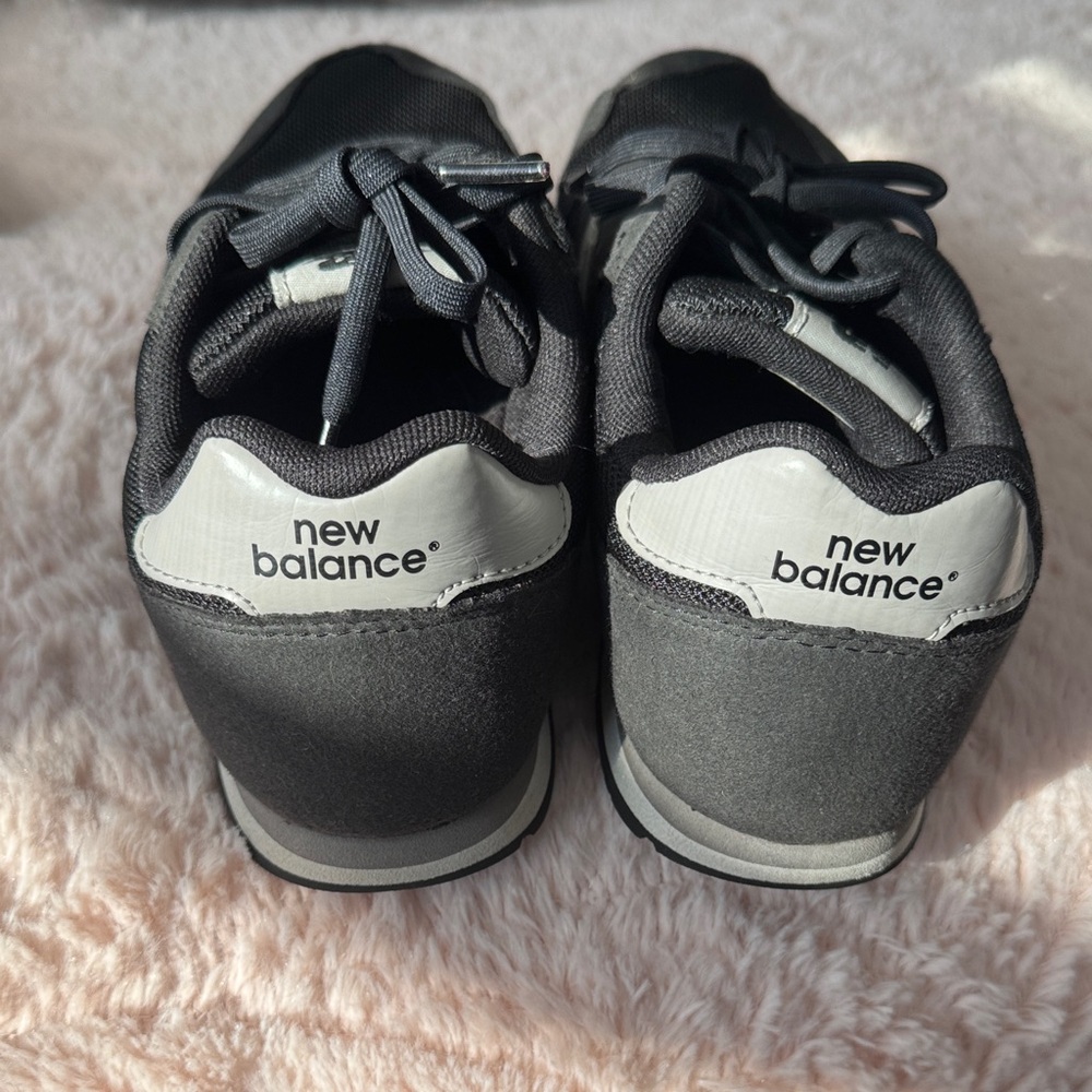 New Balance Black and White Athletic Shoes - Picture 8 of 9